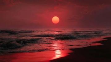 夕阳西下,天边被染成一片红色(窗外的夕阳作文)